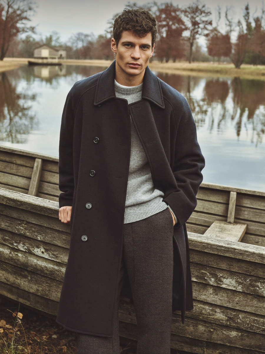 Navy peacoat over grey cashmere